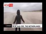 مقاومت یک فرد در مقابل تندباد سیارا در ساحل هلند 