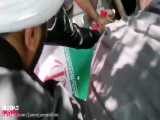 لحظه بازکردن تابوت شهید اصغر پاشاپور برای تدفین