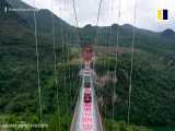 افتتاح طولانی ترین پل شیشه ای دنیا در چین