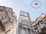سقوط پژو 405 از ساختمان 15 طبقه