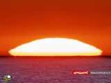 نمایی فوق العاده نزدیک از طلوع آفتاب در خط ساحلی اقیانوس اطلس
