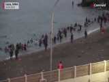 تصاویری از مهاجران در سئوتا موج عظیم انسانی از دریا و مراکش وارد اسپان