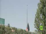 پایین کشیدن پرچم افغانستان پس از تصرف کابل توسط طالبان