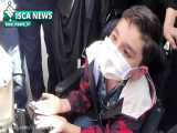 اعتراض کودک بیمار مبتلا به اس ام ای در تجمع مقابل مجلس