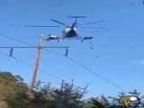 تعمیر کابل برق به کمک هلیکوپتر