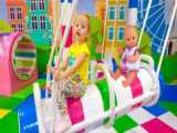 Stacy at new Indoor Playground with baby doll