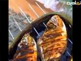 ایده جالب کباب کردن ماهی با منقل طبیعی
