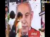 حمله به عکس نتانیاهو در سئول