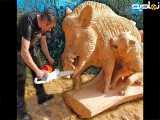 ساخت مجسمه چوبی گراز و سگ با تنه درخت